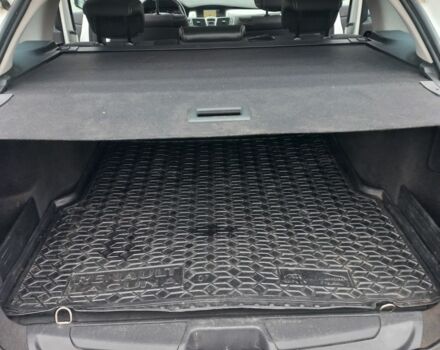 Рено Лагуна 2011 в Хмельницком на Automoto.ua Белый Рено Лагуна, объемом двигателя 2 л и пробегом 274 тыс. км за 6500 $, фото 14 на Automoto.ua