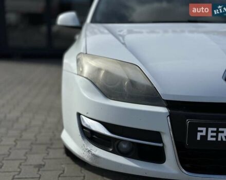 Рено Лагуна 2012 в Черновцах на Automoto.ua Белый Рено Лагуна, объемом двигателя 1.46 л и пробегом 406 тыс. км за 6500 $, фото 4 на Automoto.ua