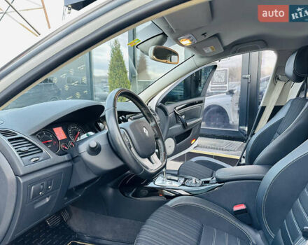 Белый Рено Лагуна, объемом двигателя 2 л и пробегом 166 тыс. км за 9900 $, фото 12 на Automoto.ua