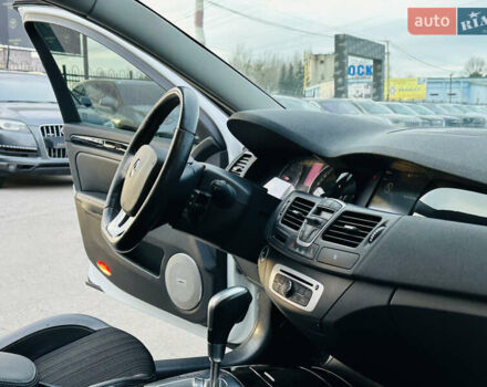 Белый Рено Лагуна, объемом двигателя 2 л и пробегом 166 тыс. км за 9900 $, фото 23 на Automoto.ua