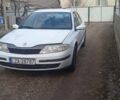Белый Рено Лагуна, объемом двигателя 1.9 л и пробегом 65 тыс. км за 875 $, фото 1 на Automoto.ua