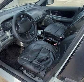 Белый Рено Лагуна, объемом двигателя 2 л и пробегом 420 тыс. км за 1700 $, фото 6 на Automoto.ua