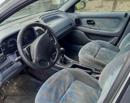 Белый Рено Лагуна, объемом двигателя 2 л и пробегом 500 тыс. км за 1250 $, фото 2 на Automoto.ua