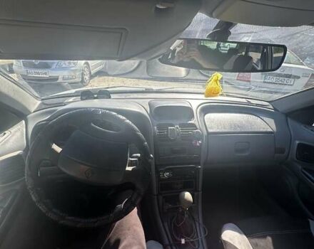 Білий Рено Лагуна, об'ємом двигуна 1.87 л та пробігом 387 тис. км за 2100 $, фото 4 на Automoto.ua