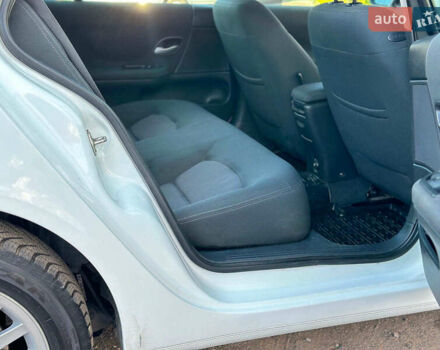 Белый Рено Лагуна, объемом двигателя 1.9 л и пробегом 231 тыс. км за 4990 $, фото 29 на Automoto.ua
