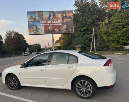 Белый Рено Лагуна, объемом двигателя 1.5 л и пробегом 298 тыс. км за 7300 $, фото 2 на Automoto.ua