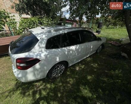 Белый Рено Лагуна, объемом двигателя 2 л и пробегом 312 тыс. км за 3400 $, фото 1 на Automoto.ua