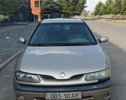 Бежевый Рено Лагуна, объемом двигателя 1.6 л и пробегом 405 тыс. км за 2400 $, фото 2 на Automoto.ua
