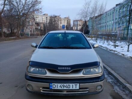 Бежевый Рено Лагуна, объемом двигателя 2 л и пробегом 250 тыс. км за 1900 $, фото 1 на Automoto.ua