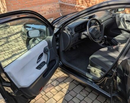 Черный Рено Лагуна, объемом двигателя 1.8 л и пробегом 314 тыс. км за 4200 $, фото 12 на Automoto.ua