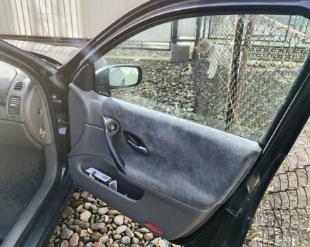 Черный Рено Лагуна, объемом двигателя 1.87 л и пробегом 210 тыс. км за 3800 $, фото 19 на Automoto.ua