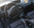 Черный Рено Лагуна, объемом двигателя 2.19 л и пробегом 288 тыс. км за 2800 $, фото 1 на Automoto.ua