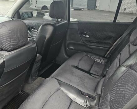 Черный Рено Лагуна, объемом двигателя 1.8 л и пробегом 252 тыс. км за 4000 $, фото 9 на Automoto.ua