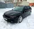 Черный Рено Лагуна, объемом двигателя 1.8 л и пробегом 252 тыс. км за 3800 $, фото 1 на Automoto.ua