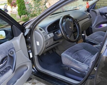 Черный Рено Лагуна, объемом двигателя 1.9 л и пробегом 320 тыс. км за 3000 $, фото 3 на Automoto.ua