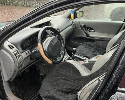 Черный Рено Лагуна, объемом двигателя 2.2 л и пробегом 248 тыс. км за 1300 $, фото 6 на Automoto.ua