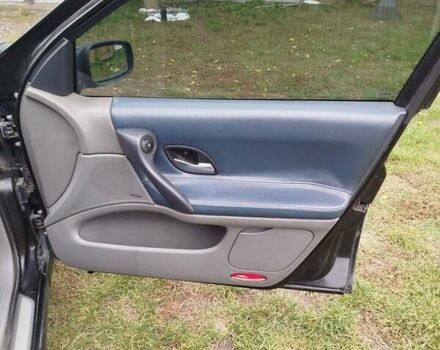 Черный Рено Лагуна, объемом двигателя 2.2 л и пробегом 287 тыс. км за 3950 $, фото 2 на Automoto.ua