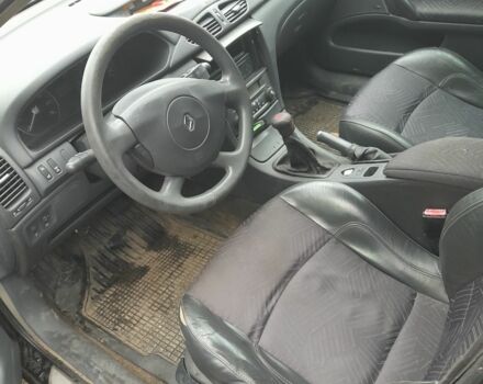 Черный Рено Лагуна, объемом двигателя 2 л и пробегом 420 тыс. км за 1800 $, фото 4 на Automoto.ua