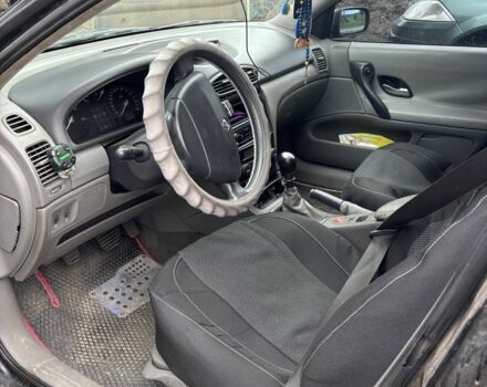 Черный Рено Лагуна, объемом двигателя 1.9 л и пробегом 350 тыс. км за 4000 $, фото 4 на Automoto.ua