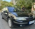Черный Рено Лагуна, объемом двигателя 2 л и пробегом 320 тыс. км за 4200 $, фото 1 на Automoto.ua