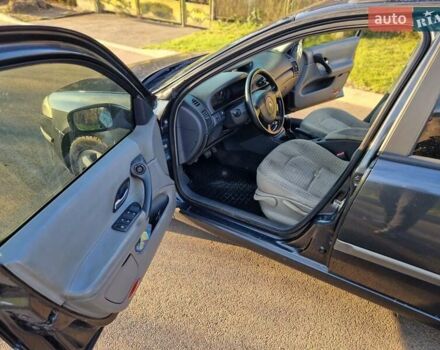 Черный Рено Лагуна, объемом двигателя 1.8 л и пробегом 371 тыс. км за 2499 $, фото 5 на Automoto.ua