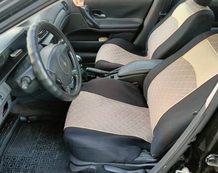 Черный Рено Лагуна, объемом двигателя 1.9 л и пробегом 337 тыс. км за 3800 $, фото 1 на Automoto.ua