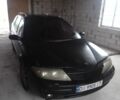Черный Рено Лагуна, объемом двигателя 2 л и пробегом 395 тыс. км за 2400 $, фото 1 на Automoto.ua