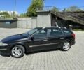Черный Рено Лагуна, объемом двигателя 1.9 л и пробегом 333 тыс. км за 3800 $, фото 1 на Automoto.ua