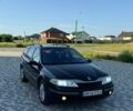 Черный Рено Лагуна, объемом двигателя 1.87 л и пробегом 342 тыс. км за 3800 $, фото 1 на Automoto.ua
