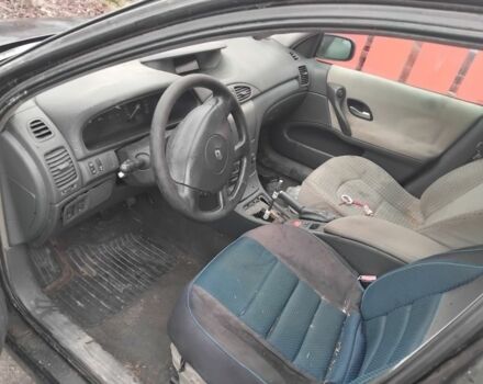 Черный Рено Лагуна, объемом двигателя 1.9 л и пробегом 300 тыс. км за 800 $, фото 2 на Automoto.ua