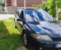 Черный Рено Лагуна, объемом двигателя 2 л и пробегом 265 тыс. км за 2500 $, фото 1 на Automoto.ua