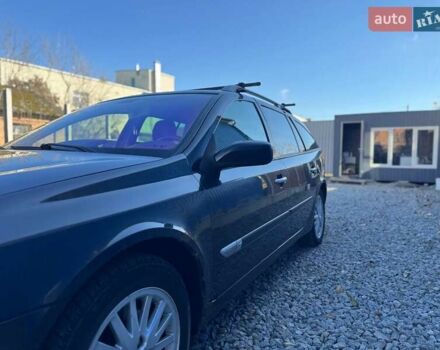 Черный Рено Лагуна, объемом двигателя 1.9 л и пробегом 220 тыс. км за 3700 $, фото 1 на Automoto.ua