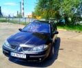 Черный Рено Лагуна, объемом двигателя 2 л и пробегом 280 тыс. км за 5500 $, фото 1 на Automoto.ua