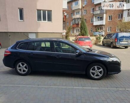 Черный Рено Лагуна, объемом двигателя 2 л и пробегом 232 тыс. км за 5950 $, фото 1 на Automoto.ua