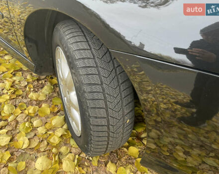 Черный Рено Лагуна, объемом двигателя 1.5 л и пробегом 302 тыс. км за 5950 $, фото 6 на Automoto.ua