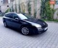 Черный Рено Лагуна, объемом двигателя 1.5 л и пробегом 251 тыс. км за 7200 $, фото 1 на Automoto.ua