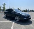 Чорний Рено Лагуна, об'ємом двигуна 2 л та пробігом 353 тис. км за 6498 $, фото 1 на Automoto.ua