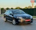 Чорний Рено Лагуна, об'ємом двигуна 2 л та пробігом 249 тис. км за 7750 $, фото 1 на Automoto.ua