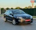 Чорний Рено Лагуна, об'ємом двигуна 2 л та пробігом 249 тис. км за 7900 $, фото 1 на Automoto.ua