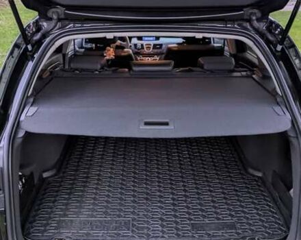 Рено Лагуна 2011 в Остоге на Automoto.ua Черный Рено Лагуна, объемом двигателя 1.5 л и пробегом 222 тыс. км за 6500 $, фото 4 на Automoto.ua