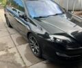 Черный Рено Лагуна, объемом двигателя 2 л и пробегом 327 тыс. км за 9350 $, фото 1 на Automoto.ua