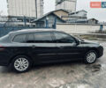 Черный Рено Лагуна, объемом двигателя 1.46 л и пробегом 267 тыс. км за 11200 $, фото 2 на Automoto.ua