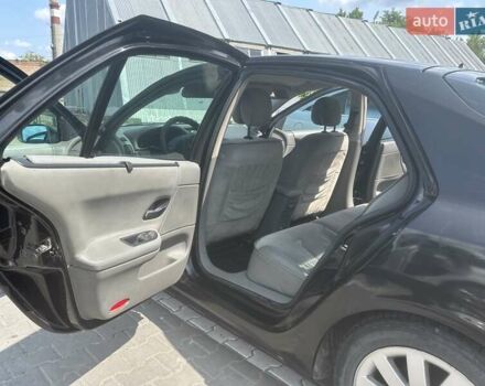 Черный Рено Лагуна, объемом двигателя 1.78 л и пробегом 431 тыс. км за 4500 $, фото 6 на Automoto.ua