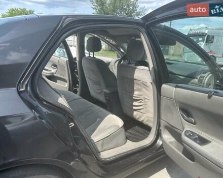 Черный Рено Лагуна, объемом двигателя 1.78 л и пробегом 431 тыс. км за 4500 $, фото 5 на Automoto.ua