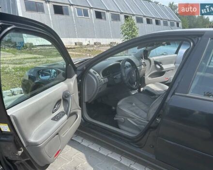 Черный Рено Лагуна, объемом двигателя 1.78 л и пробегом 431 тыс. км за 4500 $, фото 10 на Automoto.ua