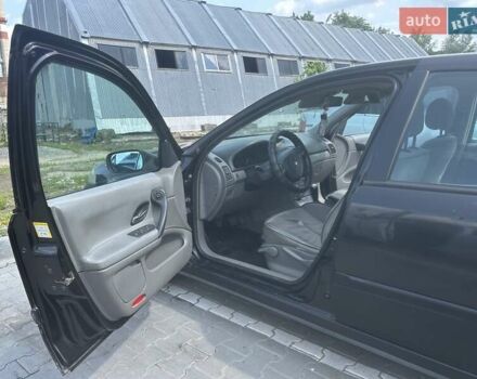 Черный Рено Лагуна, объемом двигателя 1.78 л и пробегом 431 тыс. км за 4500 $, фото 8 на Automoto.ua