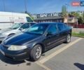 Черный Рено Лагуна, объемом двигателя 2 л и пробегом 221 тыс. км за 3900 $, фото 1 на Automoto.ua