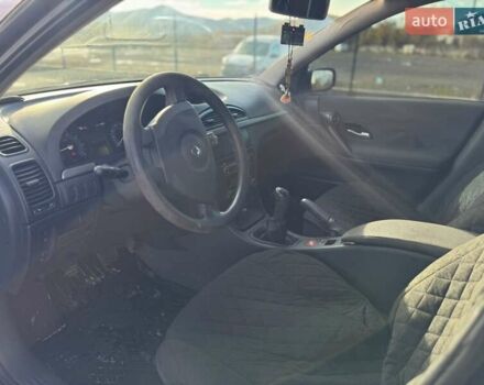 Черный Рено Лагуна, объемом двигателя 1.6 л и пробегом 146 тыс. км за 3850 $, фото 2 на Automoto.ua