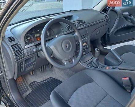 Черный Рено Лагуна, объемом двигателя 1.6 л и пробегом 99 тыс. км за 5300 $, фото 20 на Automoto.ua