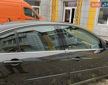 Черный Рено Лагуна, объемом двигателя 2 л и пробегом 190 тыс. км за 12500 $, фото 37 на Automoto.ua